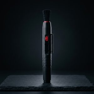 Lens_cleaning_pen_on_slate_202608162037